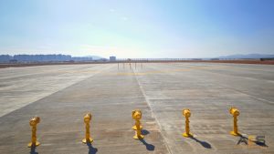 Elevated LED runway edge light at airport taxiway edge