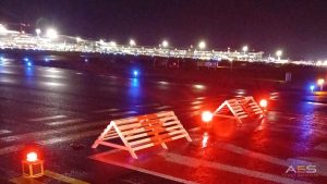 Solar runway edge lights deployed at night showing red colour configuration