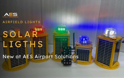 AES solar airfield ground lights with integrated solar panel.