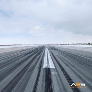 Van airport runway partially covered by snow during winter operations