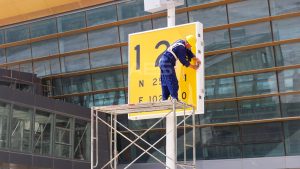 a taxiway sign under maintenance works 